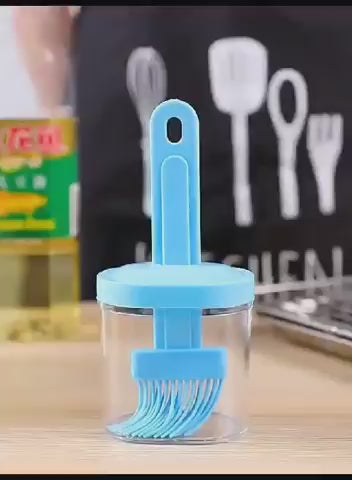 Oil bottle with brush